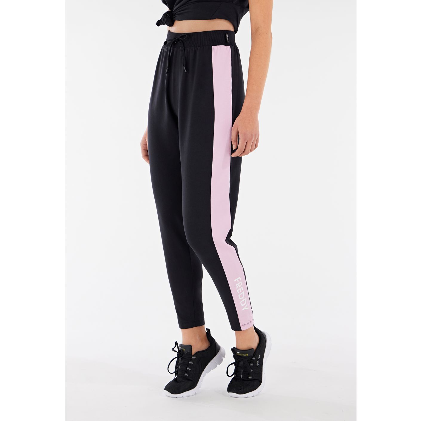 Freddy CARROT CUT TROUSERS IN HEAVY JERSEY STRETCH, CONTRASTING BAND ON THE LENGTH OF THE LEFT LEG + FREDDY PRINT ON THE BOTTOM