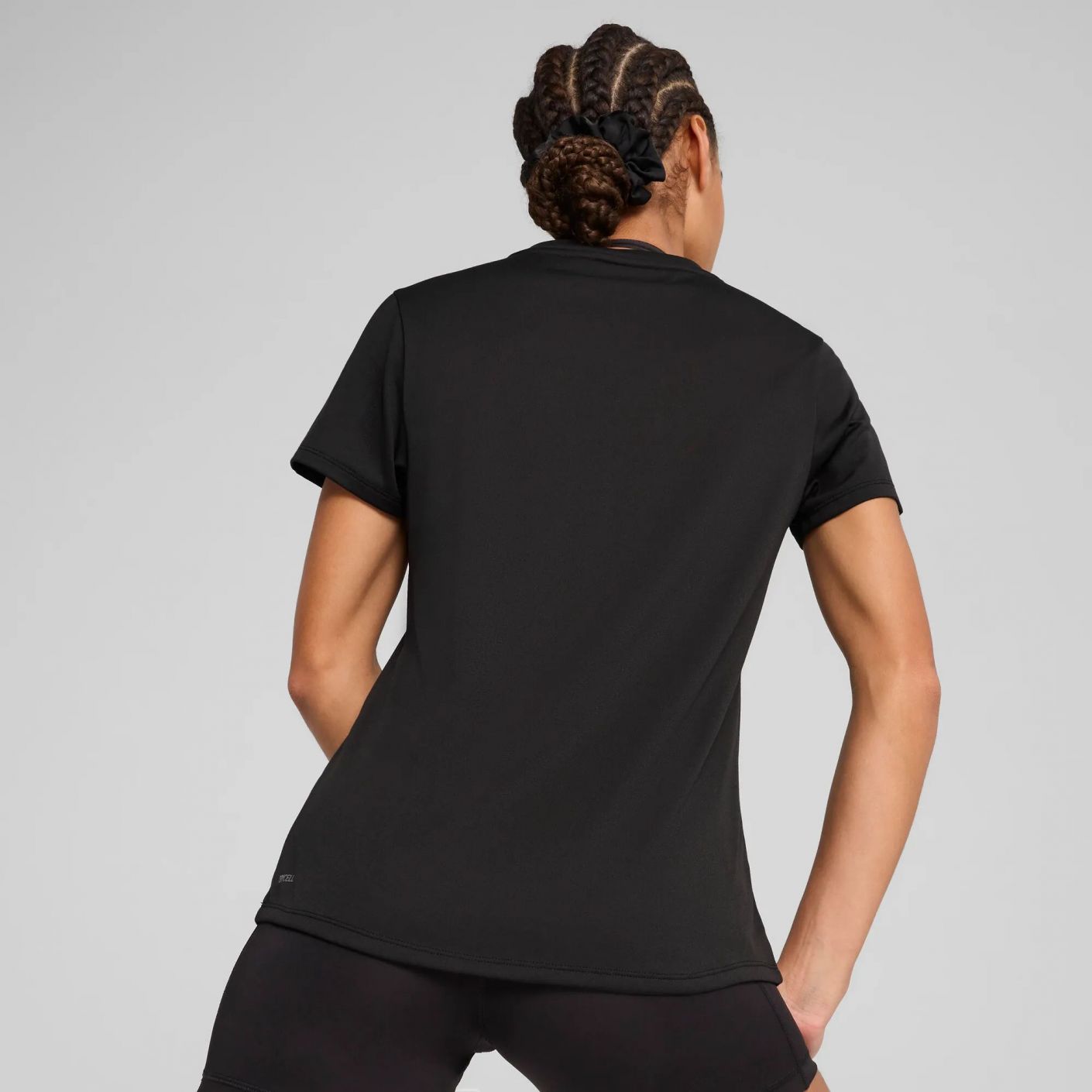 Puma TAD – Schwarzes T-Shirt mit V-Ausschnitt für Damen